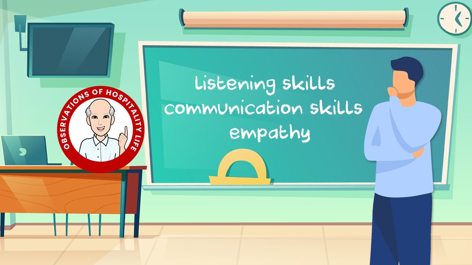 Man standing in front of a chalk board with Communication Skills, Empathy and Listening skills written on it