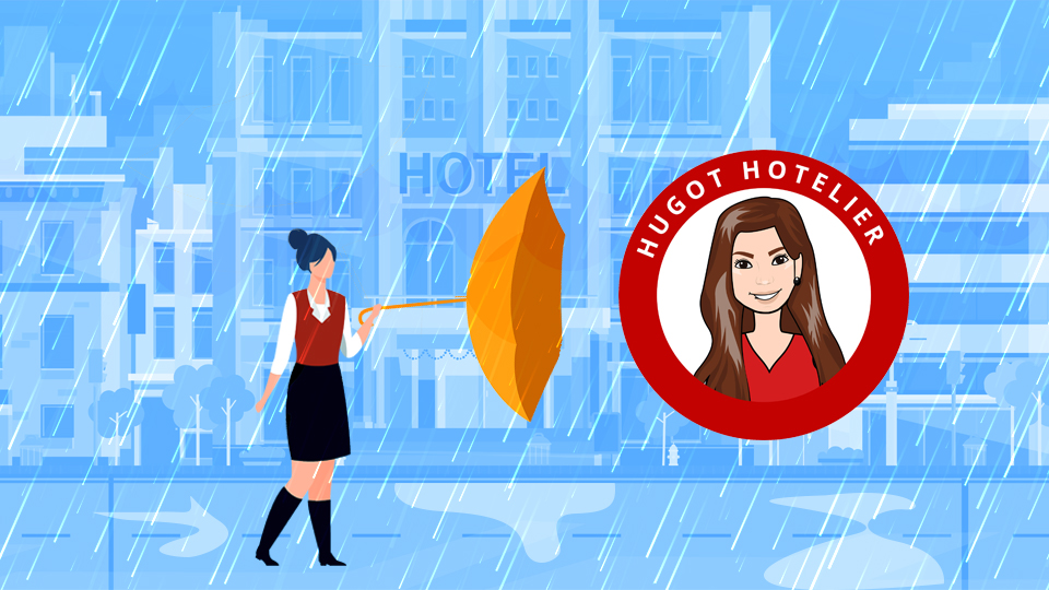 Hotel employing walking with an umbrella blown inside out. Article A Hoteliers Role During Natural Disasters by MY RANGGO Hospitality Magazine Philippines